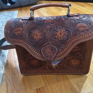 Brand new never used gorgeous leather briefcase. Paid $400